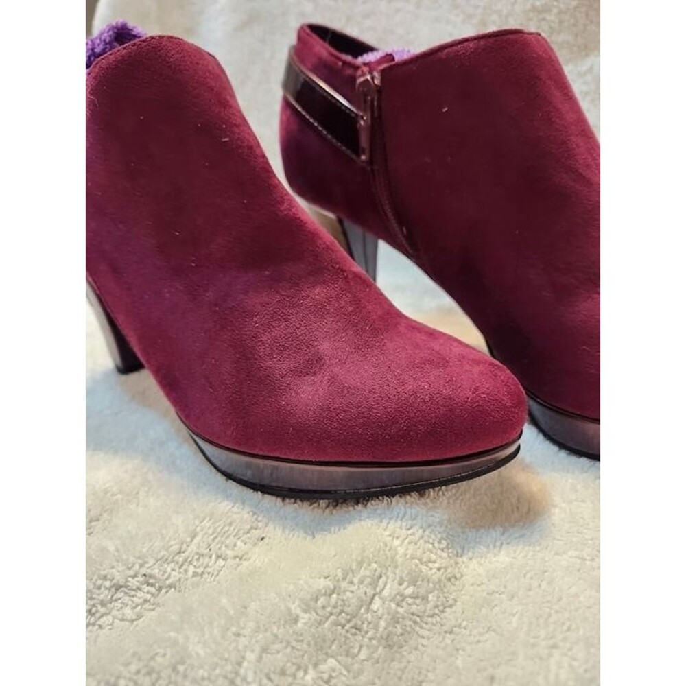 Women’s East 5th faux suede ankle booties in a rich maroon color with glossy pat